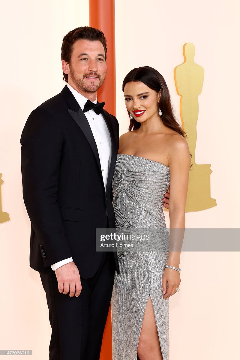 topgunarchive's tweet photo. Miles and Keleigh Teller attend the 95th Annual Academy Awards on March 12, 2023 https://t.co/Uo9y73gPnx