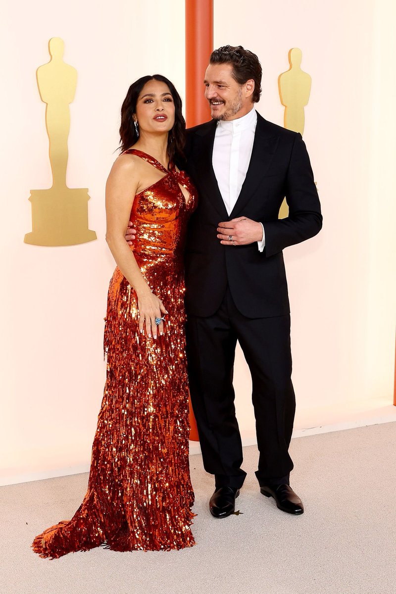 ScreenSpeck's tweet photo. Salma Hayek and Pedro Pascal attend the 95th Annual Academy Awards on March 12, 2023 in Hollywood, California. (Photo by Arturo Holmes) #oscars https://t.co/wtFAw6MgoD