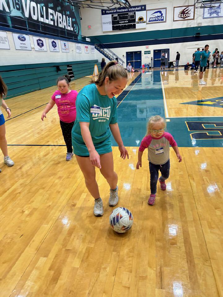 HoggardWsoccer's tweet photo. Super proud of these young ladies for not only their efforts in classroom and on the field but also for volunteering their time to help out in the community. Four of @HoggardWsoccer finest working with special needs soccer players on the campus of UNCW. https://t.co/vU5SJNXU7k