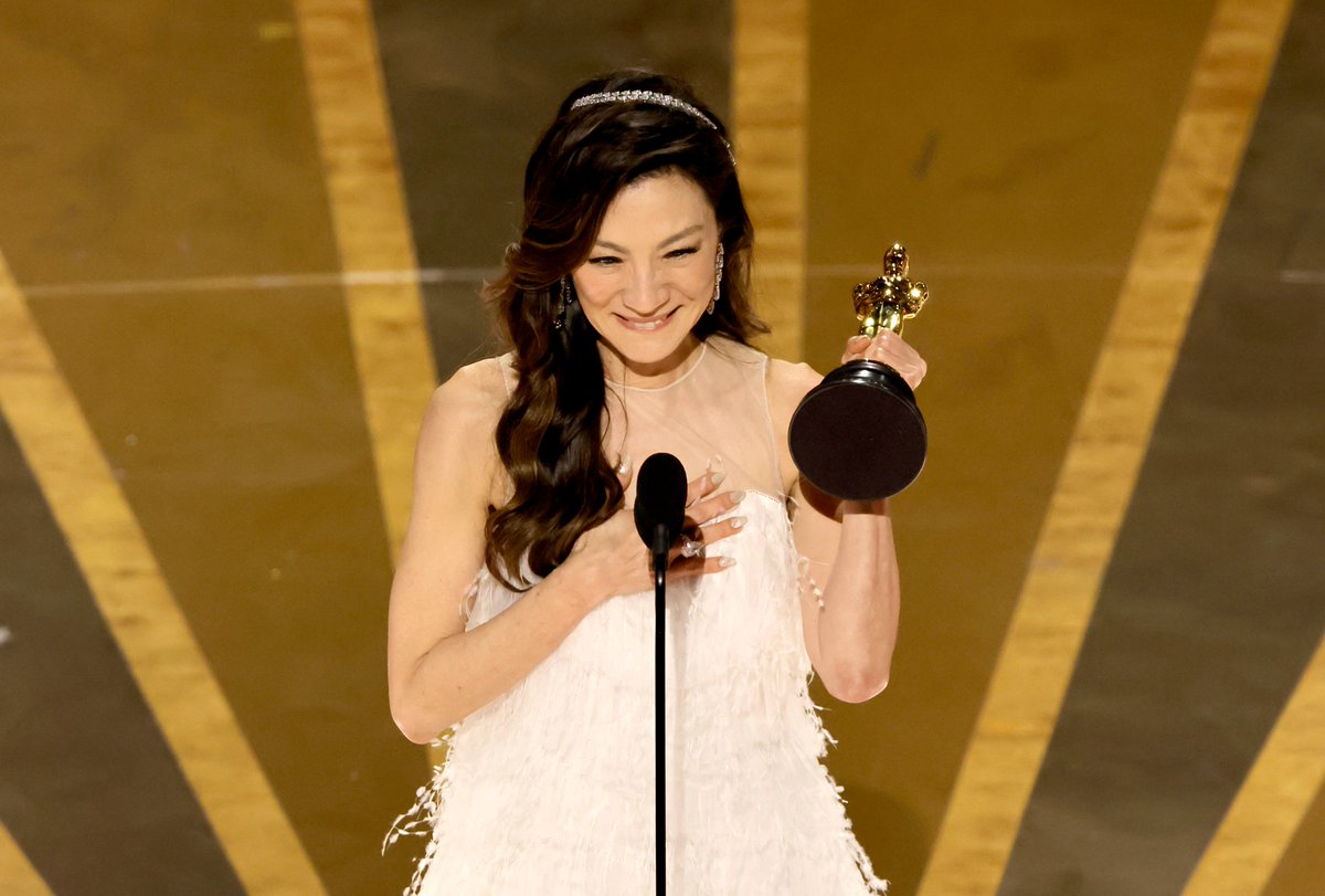 glamourmag's tweet photo. "And ladies, don't let anybody tell you you are past your prime. Never give up." Congratulations to Michelle Yeoh on her #Oscars95 win for best actress. https://t.co/7dlbEHHWTe