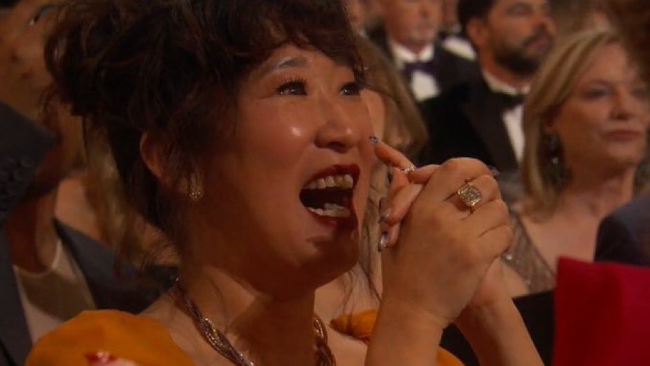 sckberry's tweet photo. Sandra Oh reacting to the #Oscars Best Picture win: 

Parasite                 Everything Everywhere 
                                             All at Once https://t.co/461NdPoby6