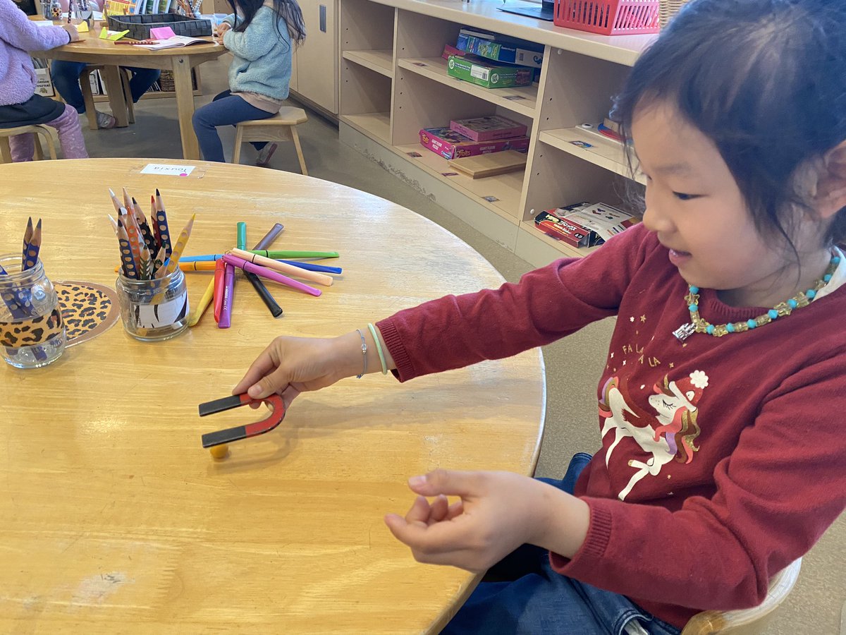 NIS_ELC's tweet photo. Big question of the day: Can pushes and pulls move objects without touching them? “The ball is dancing and spinning and running away from me!😂” Kindergarteners were investigating the invisible force of magnetism. #NISinquire #NISinspire #InvisibleForces #PushAndPull https://t.co/u2wGh5R4nA