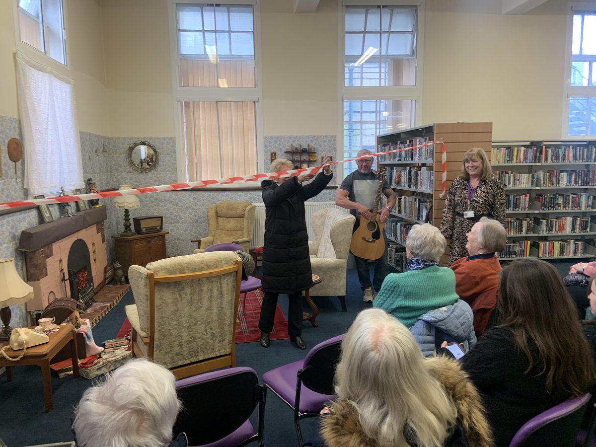 LibrariesNL's tweet photo. Today was the launch of our #MemoryRoom in #AirdrieLib. This fantastic area is now available for visits during normal opening hours.
The Memory Room was opened by Bridget Ann Devanney who help supply the furniture. Our audience has been entertained by storyteller Gerry Durkin. https://t.co/0b4W9N0kCV