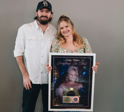 RIAA's tweet photo. An #RIAATopCertified 📀Gold📀 plaque for #EverythingSheAint is the breakfast of champions. Congrats @haileywhitters  and @songsxdaughters &amp; @bigloud teams! Read more in @people ⬇️https://t.co/QjxBHxV2pL. https://t.co/gSYHnitMWW