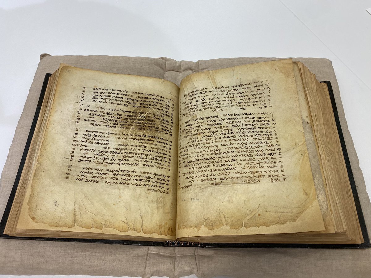 m_schmierer's tweet photo. Thought to be the oldest surviving copy of the Samaritan Pentateuch, CUL Add.1846 on display today @theUL. The grease stain at Numbers 6:24-26 is the result of centuries of kisses. Digitised here: https://t.co/l913DyaYzi https://t.co/AiFOUcjZDQ