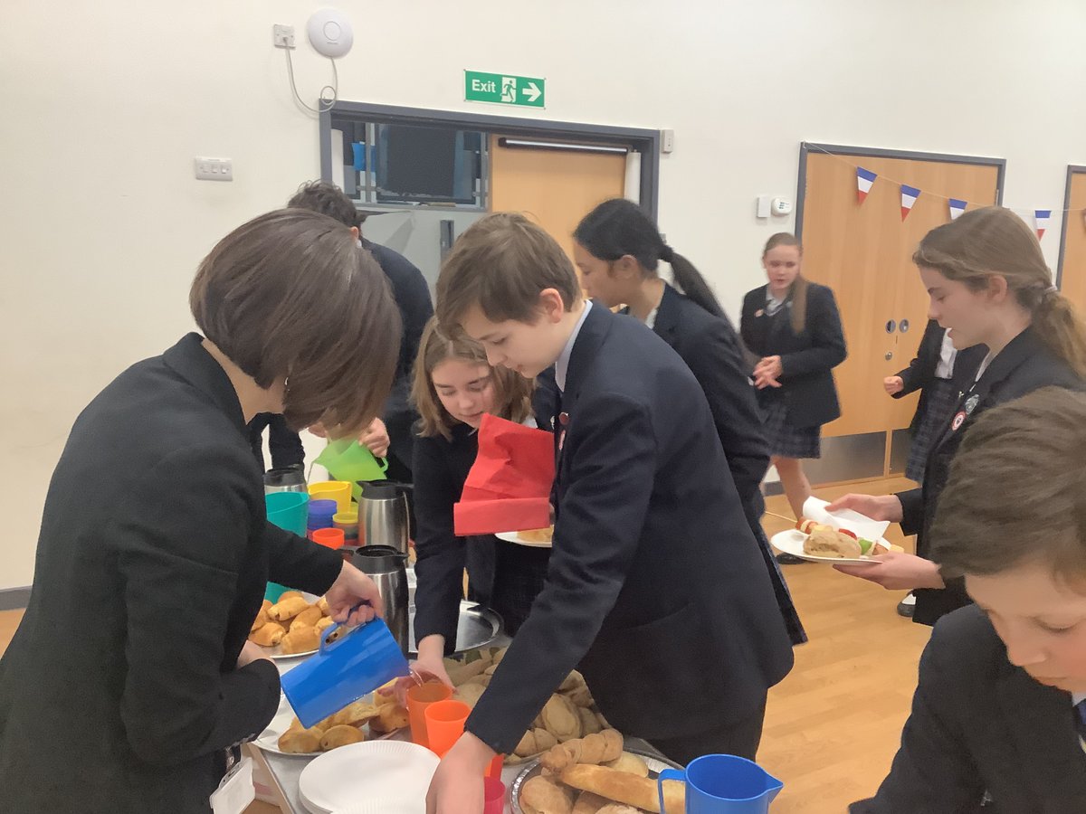 DunottarSchool's tweet image. Today, Year 8 pupils were invited to visit Reigate Parish Church Primary School to participate in their French café day with Year 3 pupils. Dunottar pupils helped serve delicious French food cooked by Year 3 and helped them practise their French! #WarriorLearning