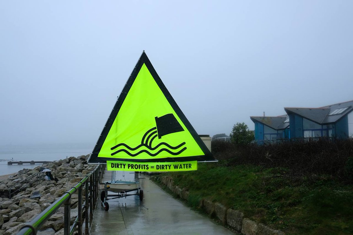 XRSouthWest's tweet image. Protestors in Penzance yesterday at Long Rock beach, which is the site of a @SouthWestWater sewage outlet. It was marked 'unsafe to swim' because of poo-llution💩. #cutthecrap #dirtywater #dirtyprofits Photos: Gavan Goulder  @Feargal_Sharkey