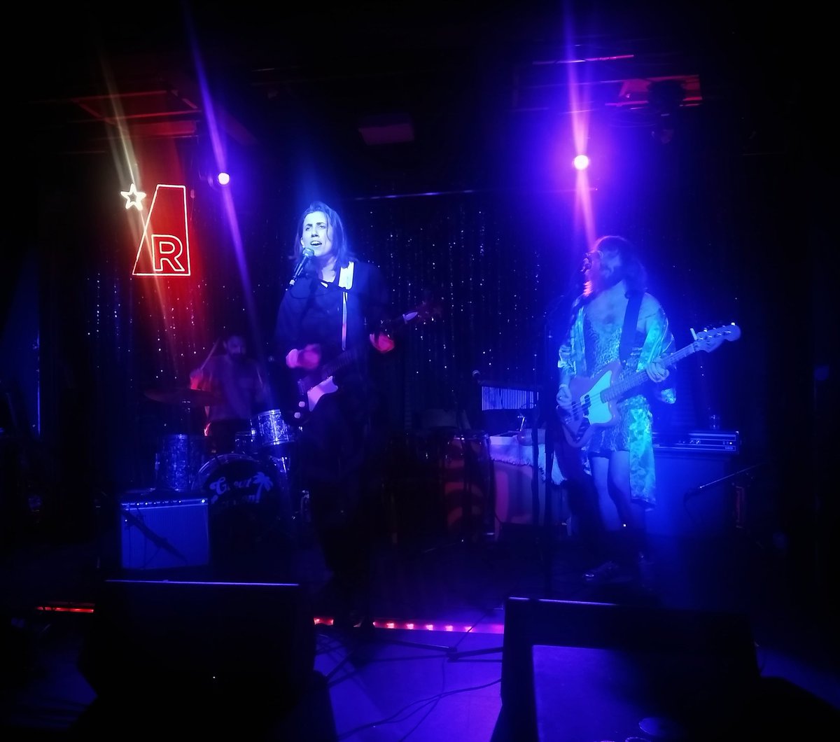 sticky_feets's tweet photo. This glowing blue human made a cowbell sound sexy last night. Michael Abalone, ER Catmaster, Riley Gearstick. @avilesmike @GenderlessGapAd @rileygeare @twin_music_ thanks for an awesome show last night!! https://t.co/1WVYroKjrs