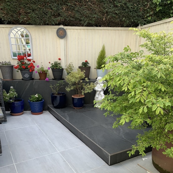PrimaPorcelain's tweet photo. We're pleased to announce that our Burlington Black porcelain paving is back in stock! 

This unique paving is perfect for creating high-contrast garden spaces like the ones you see below 😍

Shop Burlington Black Now 👇
https://t.co/dVTdYslv58 https://t.co/05wQa1p3Bn