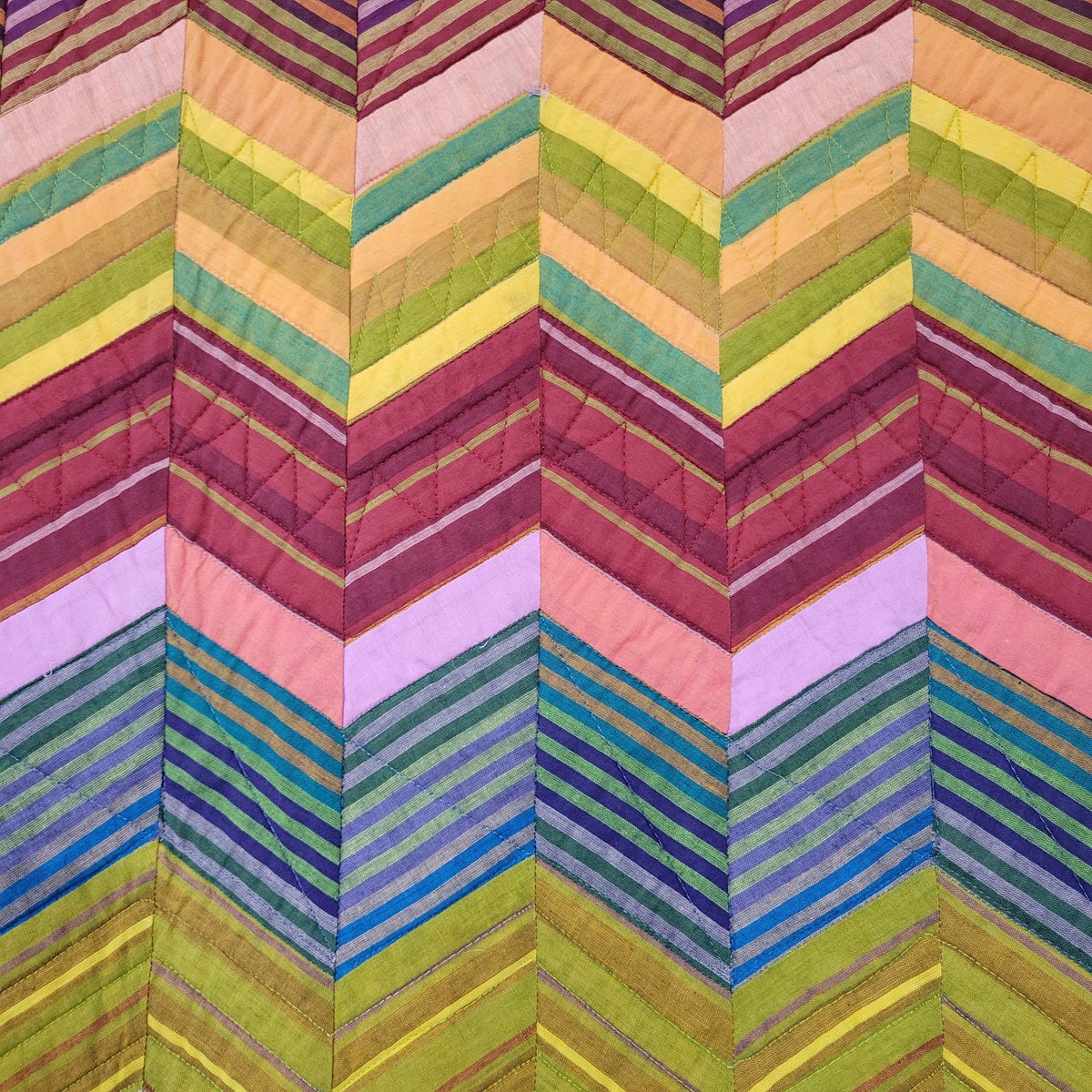 The galleries are bursting with color right now - especially in the <a href="/KaffeFassettStu/">Kaffe Fassett Studio</a> exhibit "85 &amp; Fabulous" from FreeSpirit Fabrics!

Here's "Rosita Zig Zag" by Kaffe Fassett - showcasing how a simple striped fabric can become a complex and exciting quilt design!
#quilt #stripes