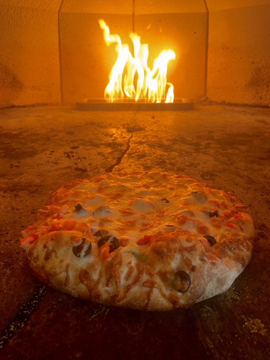 Pizza of the week: Pesto Artichoke! 

A vegetarian favorite, we start with our house made pesto, sourdough from our bakery, and top it with artichoke hearts, garlic, black olives, and red peppers. Finished off with melty mozzarella. See you soon!