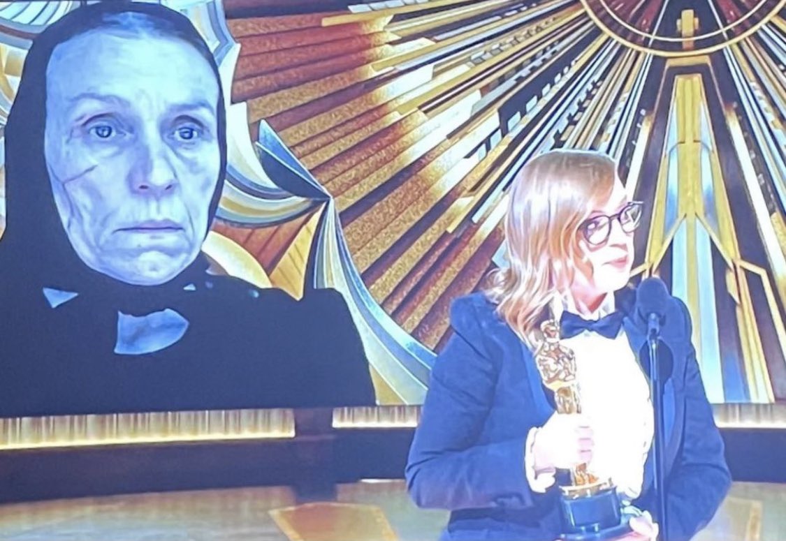 Me standing behind the person ordering at Starbucks