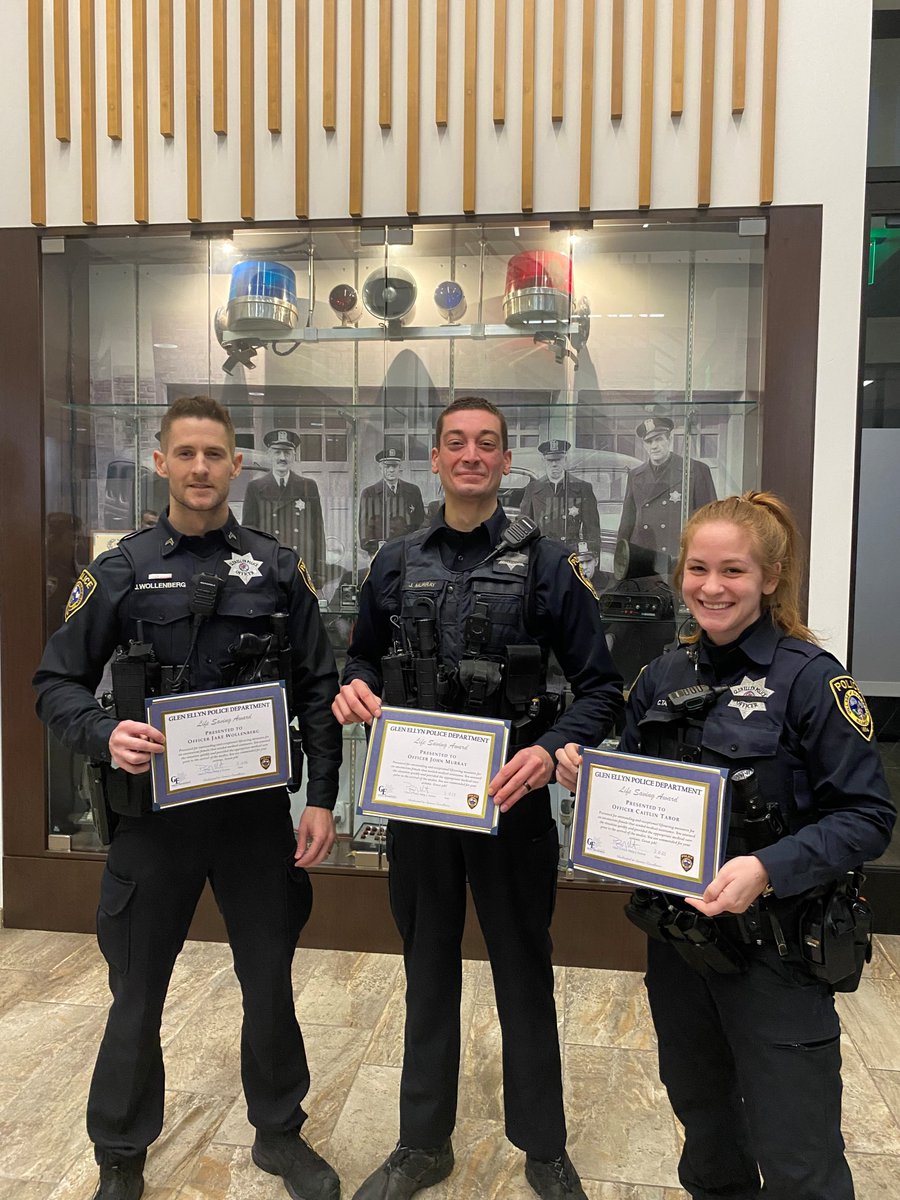 GlenEllynPolice's tweet photo. Congratulations to Ofc. Wollenberg, Ofc. Murray and Ofc. Tabor on receiving a GEPD lifesaving award. They responded to a medical emergency and administered CPR and shock using an Automated External Defibrillator (AED). These lifesaving efforts were key in the patient's survival! https://t.co/P62CaihYCl