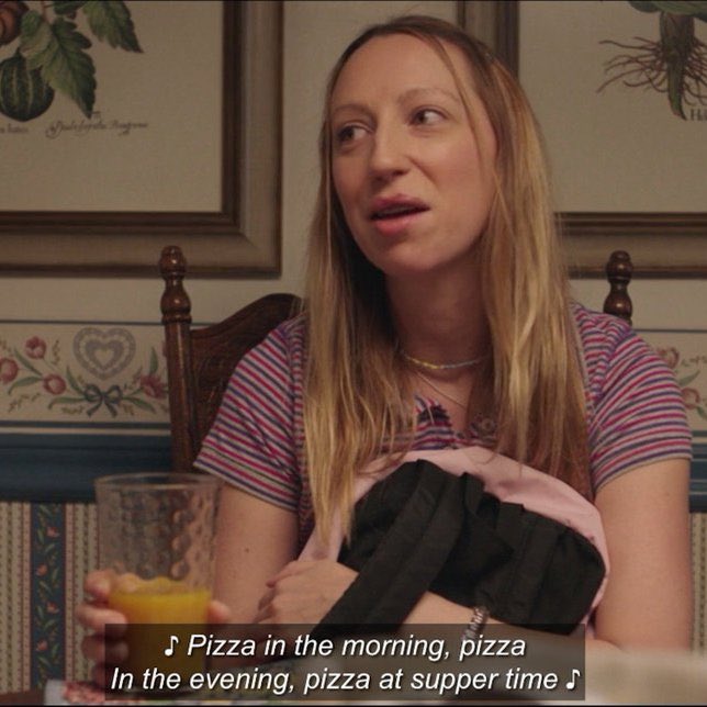 classhalfull's tweet image. Me, handing out pizza at the Writing Center event