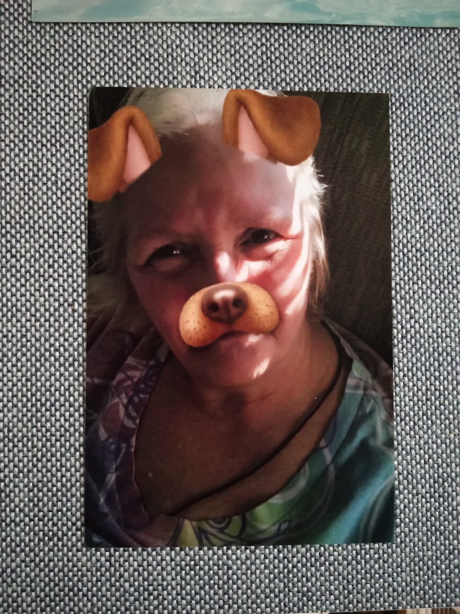 I'm working on the last photo board today and I just had to make this the center of the board. This is so my Grandma, happy and silly, and I am going to miss her so much.