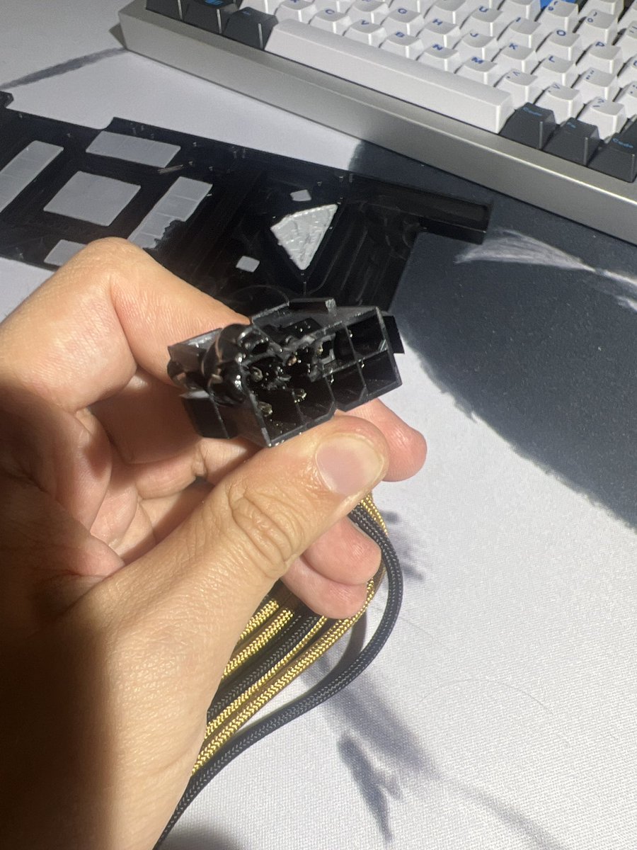 Sullivandamn's tweet photo. @LinusTech RTX A6000 adapter caught fire, luckily card itself was in good condition! https://t.co/mez2InopO7