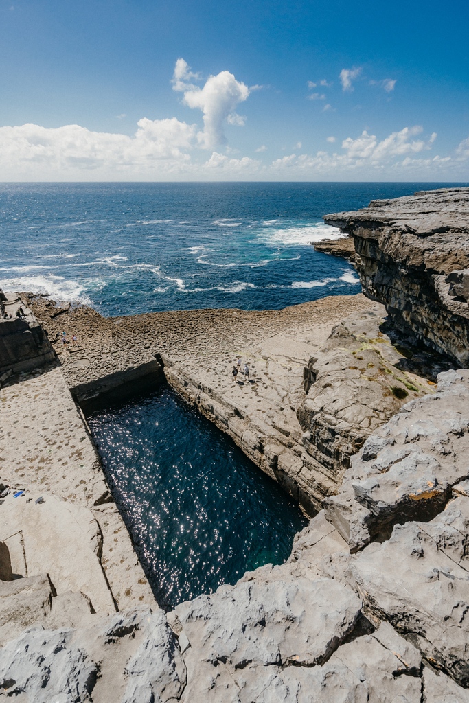 Although you’ll often hear it called ‘the Serpent’s Lair’ and ‘the Wormhole’, the name of one of the Aran Islands most unique attractions is ‘Poll na bPeist’ 🐍 Read all about it: theirishroadtrip.com/the-wormhole-i… Photo via Shutterstock #TheIrishRoadTrip @Failte_Ireland @TourismIreland