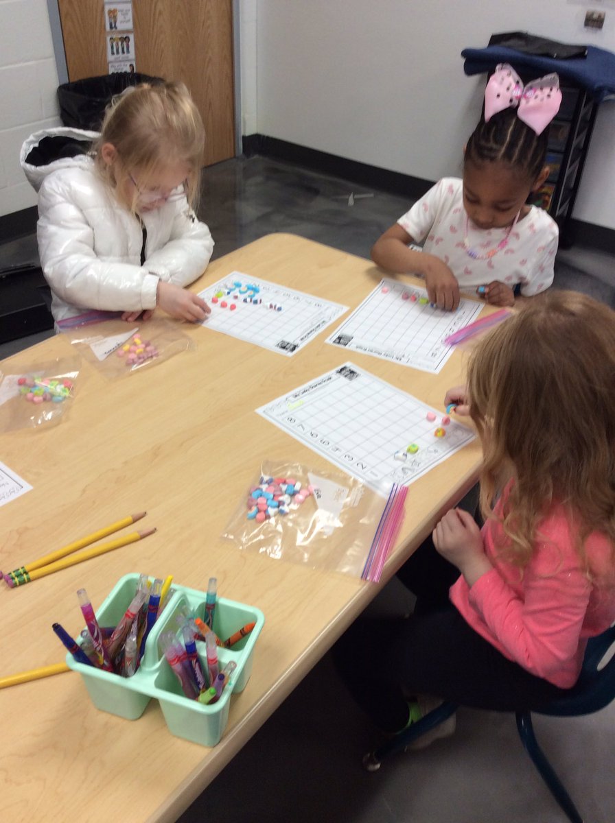 HandleyCTEClass's tweet image. Graphing with Lucky Charms marshmallows.