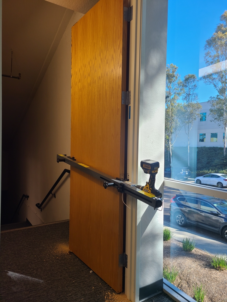 How do they get that wire through the door. This is how . We drill through the door from hinge to lock. Certified for door raceways with recertification stickers . 
#raceway #electroniclock #locksmithnearme #yorbalinda  #locksmith #doorcoring #retrofit