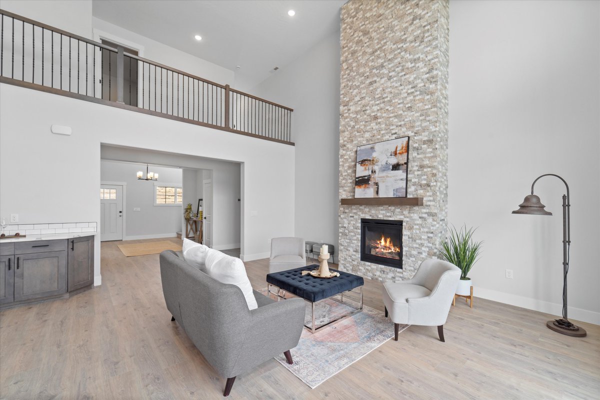 The great room in our Cypress home plan is the perfect blend of modern luxury and cozy comfort. Imagine gathering around this fire in solitude or with close company and letting the stresses of the day melt away!

#lexarhomes #cypress #homeplan #customhomebuilder #customhome
