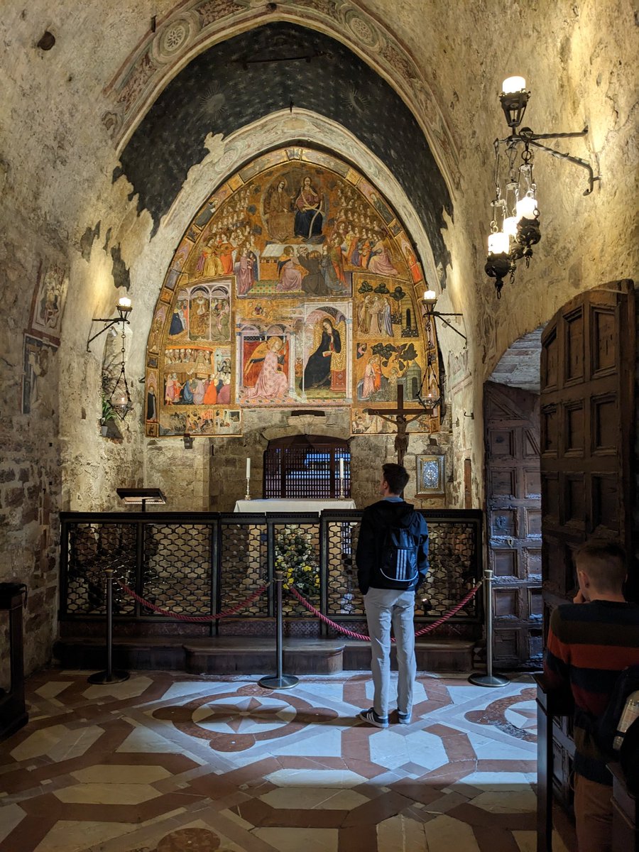 NewmanInstCTC's tweet photo. Day 2 began in Assisi with Mass at the tomb of St. Francis.  Then to the basilica of St. Clare to pray before the San Damiano crucifix and at the tomb of St. Clare herself. Before heading to Florence our group stopped at the Porziuncola. https://t.co/u5QaifmZd7