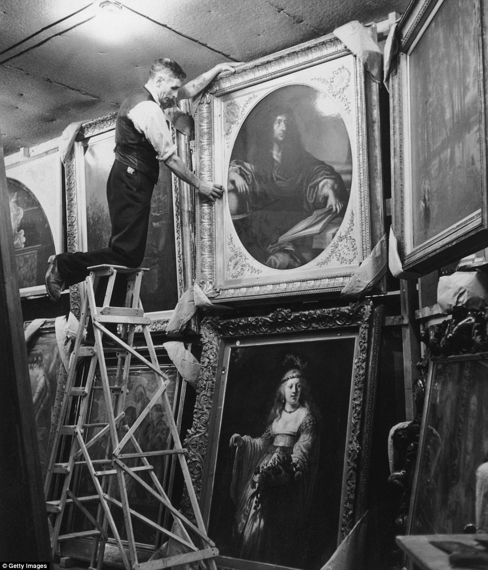 Knowledgepoint's tweet image. Paintings from the National Gallery, moved deep within a Welsh mountain to protect them from Nazi hands, undergo their daily dusting by an expert in a subterranean chamber at Manod Quarry, north Wales.