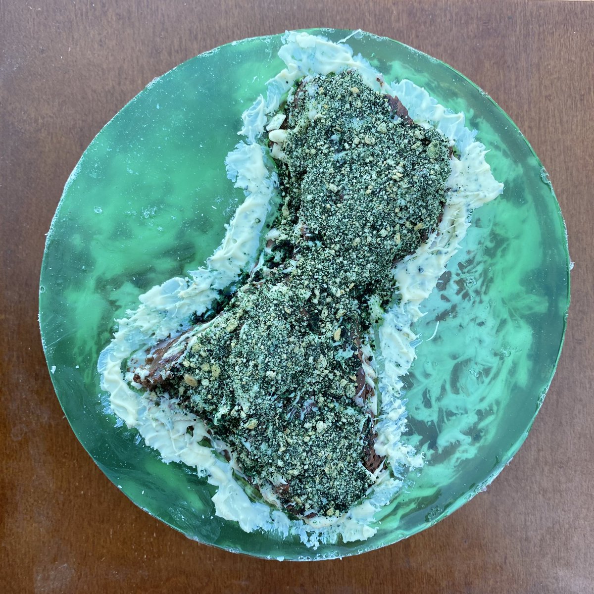 domjohn55's tweet photo. Biba Mes CHamoru! 

Here’s a cake I made and carved in the shape of Guåhan. I covered that in chocolate ganache and then poured over a gelatin mixture dyed a clear turquoise. The cake is finished with dyed cookie crumbs and white chocolate waves. https://t.co/pcrqNEYXY2