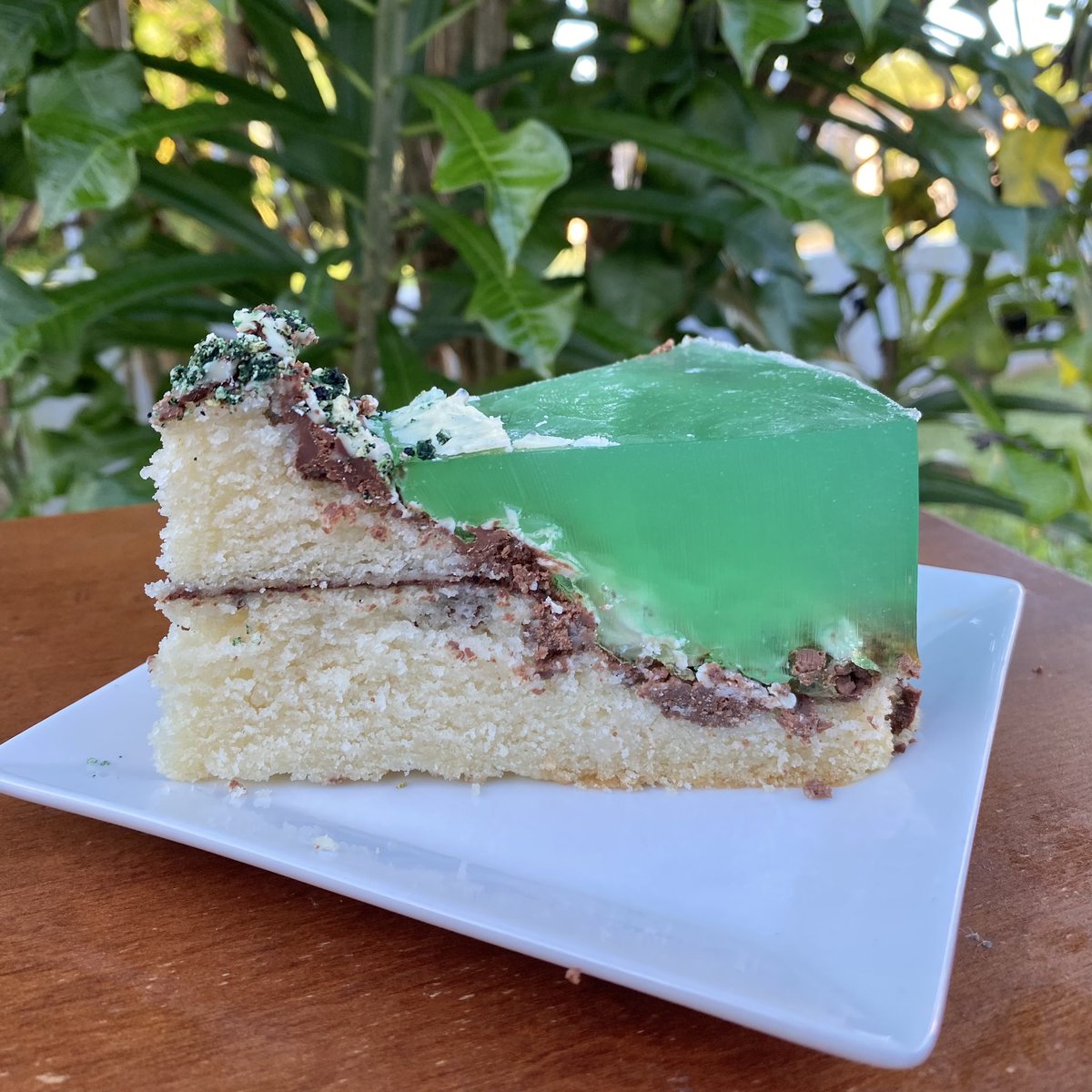 domjohn55's tweet photo. Biba Mes CHamoru! 

Here’s a cake I made and carved in the shape of Guåhan. I covered that in chocolate ganache and then poured over a gelatin mixture dyed a clear turquoise. The cake is finished with dyed cookie crumbs and white chocolate waves. https://t.co/pcrqNEYXY2