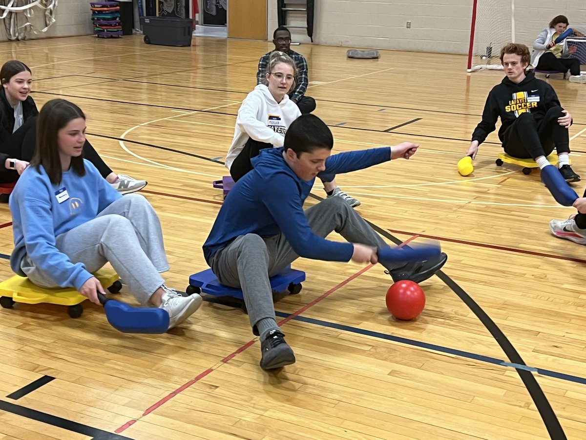 LHSLancerPrin's tweet photo. Tonight, our @LafayetteBest buddies group hosted “Students’ Night Out” in our gym. We invited our friends from EHS, Summit, and MHS. A great time was had by all- but my favorite was the costume relay! 🖤💛 💜🖤💙💚❤️🖤#connectedlancer @thelancerfeed @rockwoodschools https://t.co/w59qVFrdmk