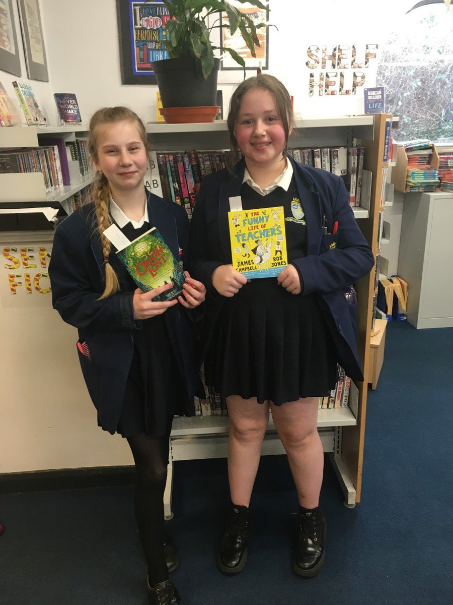 Lexi and Aliya looking really happy with their free books.  Proud of these 2 for being nominated! <a href="/ASCCEnglish/">All Saints English</a>