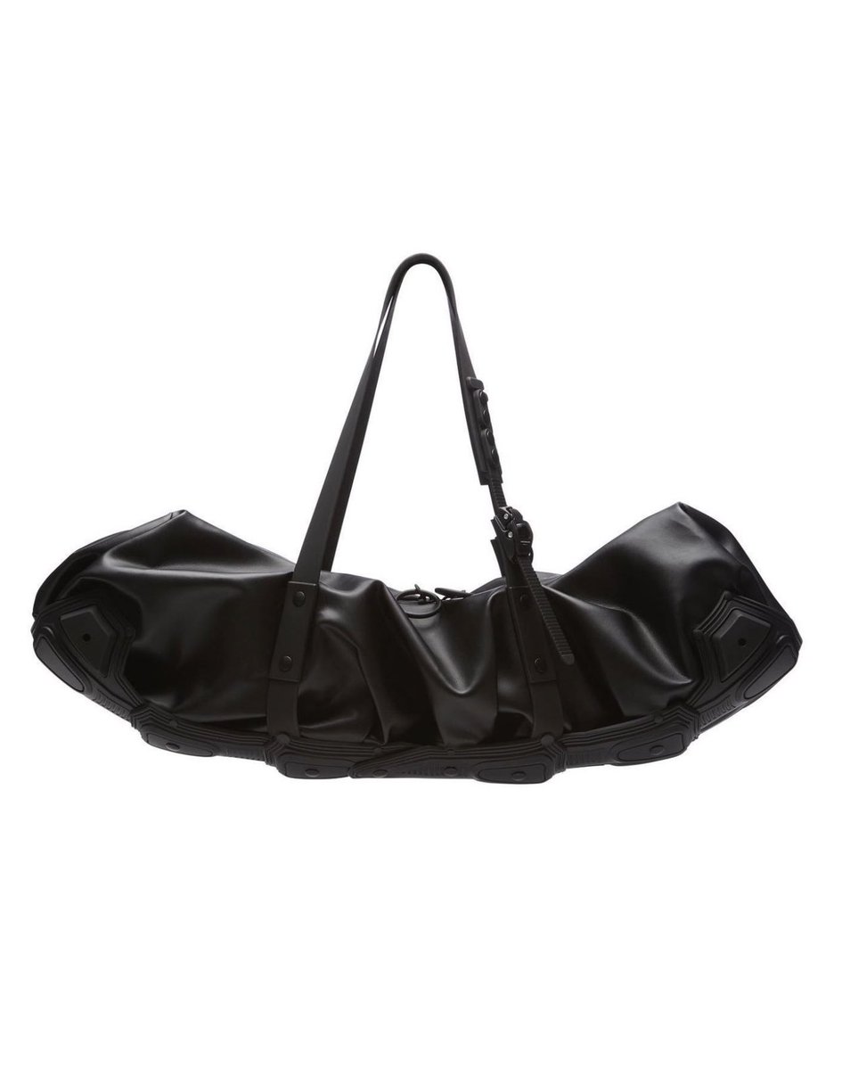StreetFashion01's tweet photo. Cyborg Baguette Bag by INNERRAUM (2023) https://t.co/dI84tVUWhE