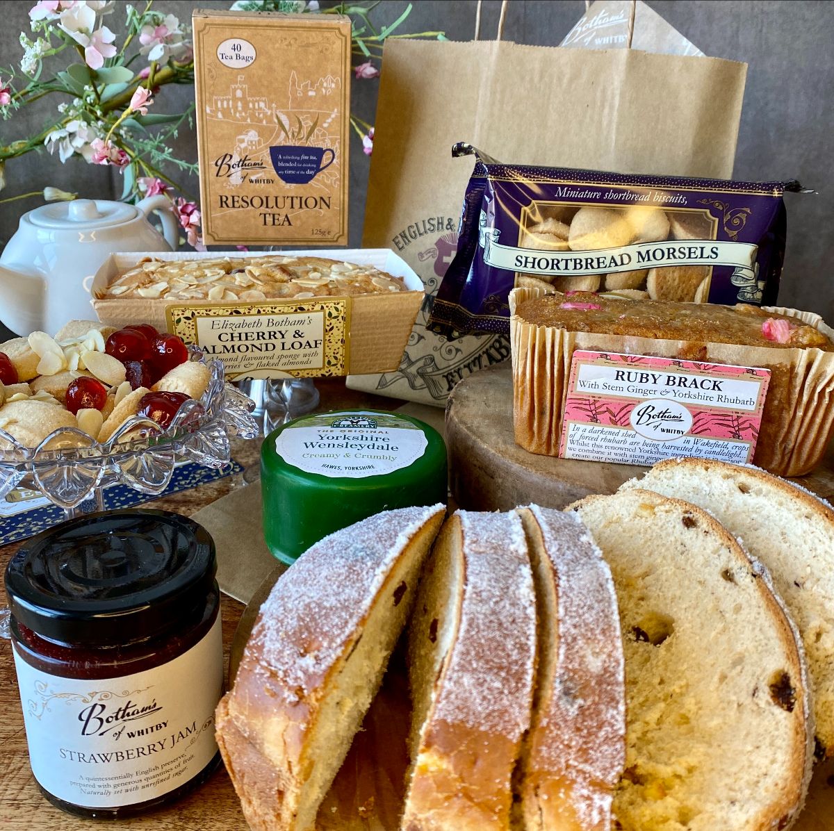 BothamsofWhitby's tweet photo. A delightful spring inspired gift by post, introducing Botham's Spring Gift Bag with Ruby Brack and Sally Lunn | Price £23.95 

Order Now > https://t.co/YRzO26t7pz 

#bothams #spring #bakes #rubybrack #sallylunn #giftsbypost #seasonalgifts #seasonalbakes #cakes https://t.co/hEFh3Xs8pO