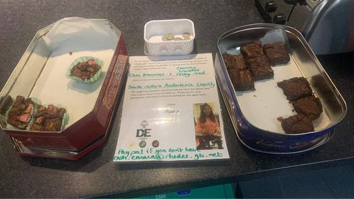 swa_charity's tweet photo. A #FabulousFundraiser has been busy baking beautiful brownies to raise funds for us, as part of her Duke of Edinburgh award. They were sold at #Exeter Emergency Operations Centre by her mum and look delicious.😋 #TeamSWASFT 💚 https://t.co/nJMMbxOkg9