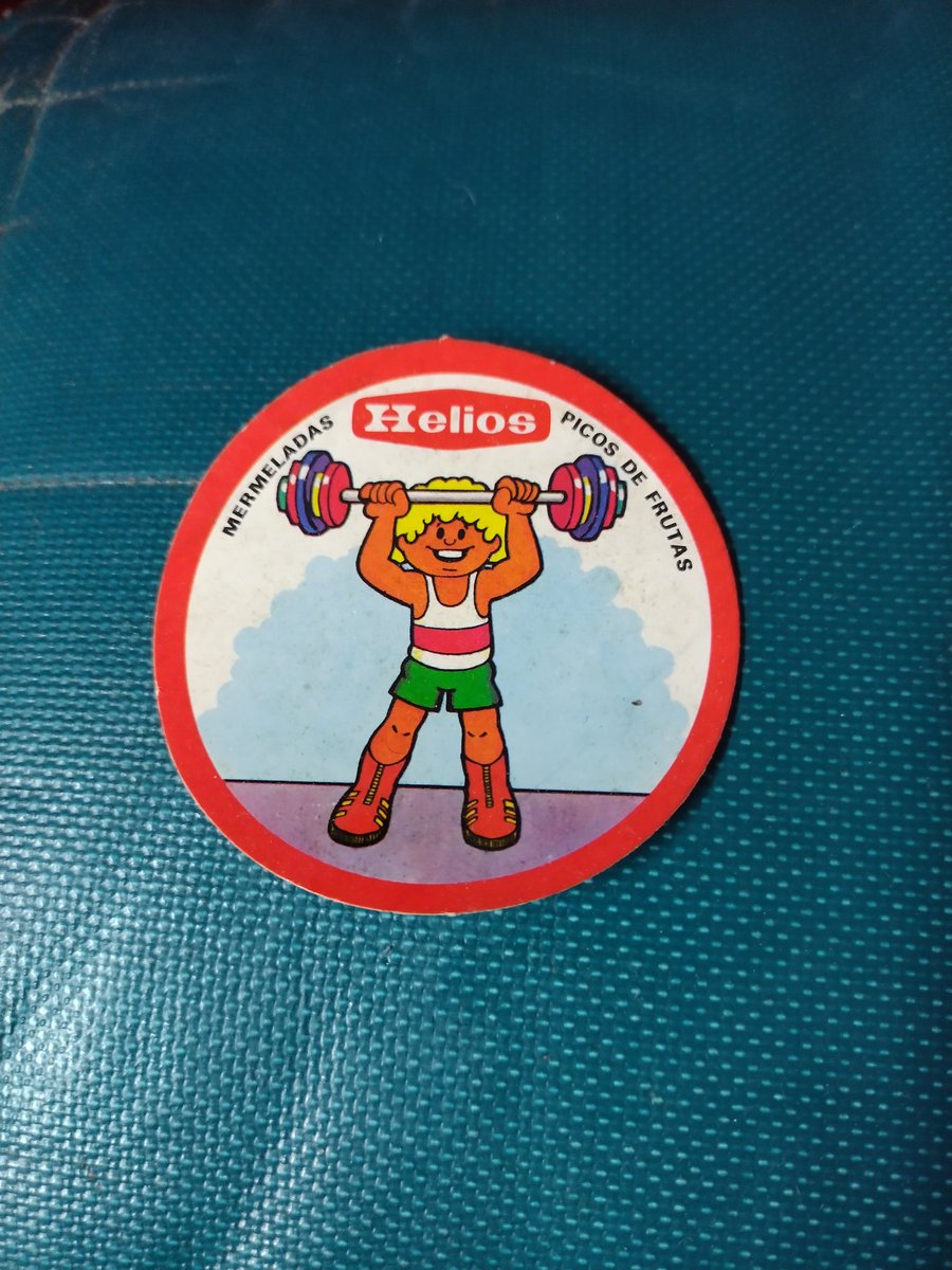 museodelafuerza's tweet photo. A la rica mermelada para endulzar tus levantamientos 
De la colección de cromos pegatinas que @helios_es dedicó a la #Olimpiada en los años 80.
#halterofilia #museo #fuerza #museodelafuerza https://t.co/qPt37RnOh4