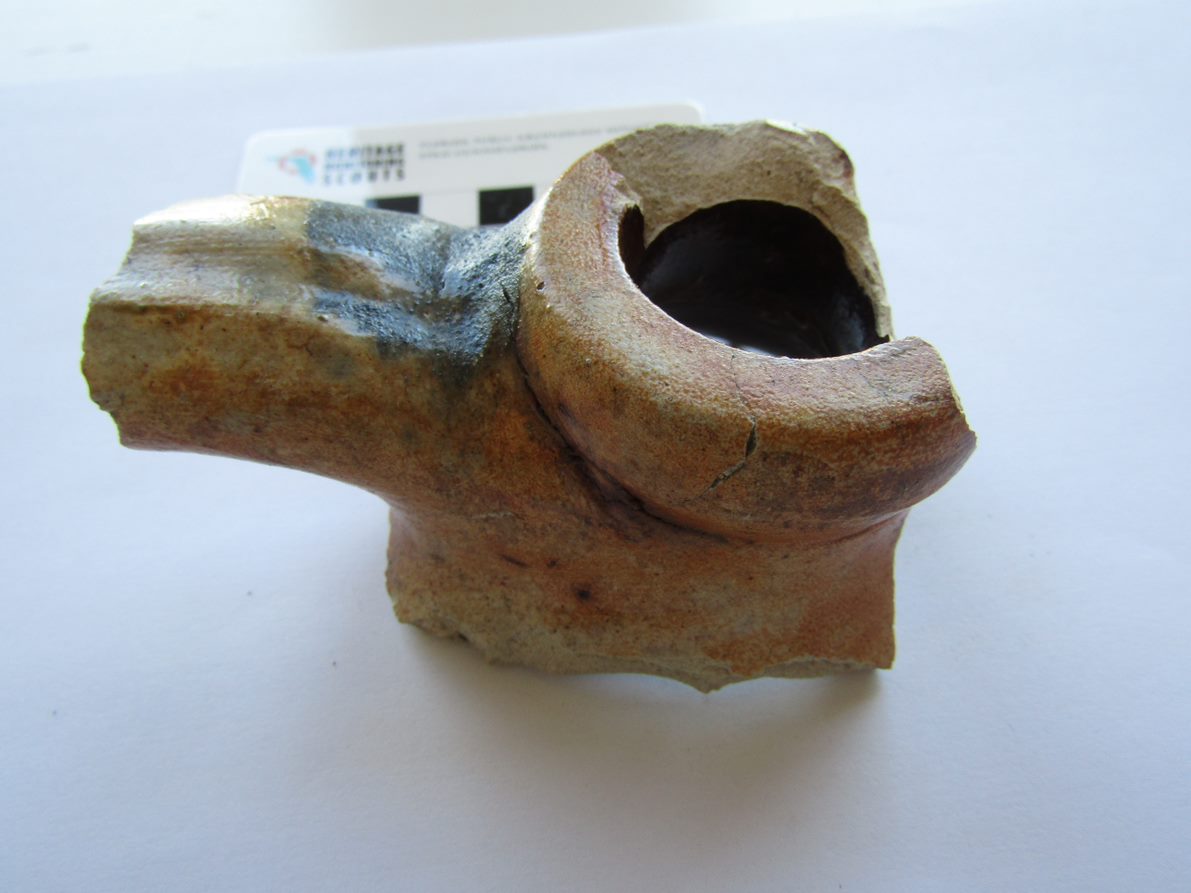 Fort Pulaski archeologists found this larger fragment of a stoneware jug in the Kitchen of the Workers’ Village. We know from the style of jug, and the brown colored glaze on the inside, called an Albany slip, that this style was common in the mid to late 19th century.