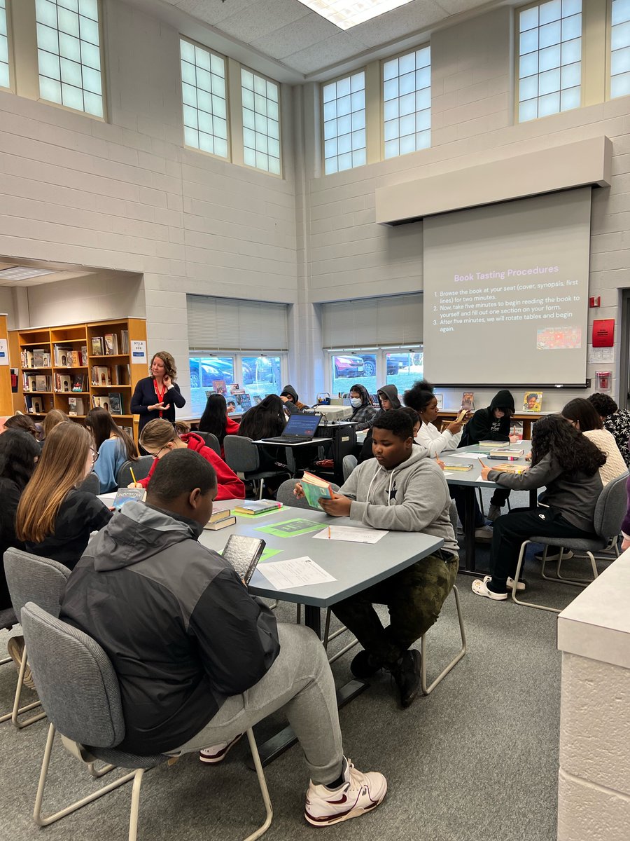 Today our 8th grade English students are being Communicators by reading to evaluate to prepare for their unit on the dystopian genre. Ms. Russo is leading them through a dystopian book tasting to get a sample of the books! @HerndonMiddle  @FCPS_LIS #fcpsPOG