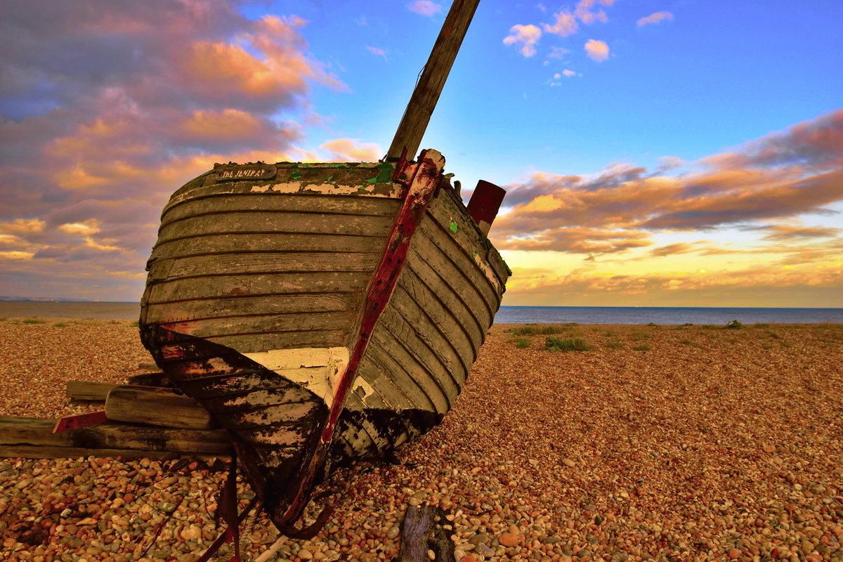 Fishing Boat beached on Dungeness shingle Dungeness, Kent, England,UK,