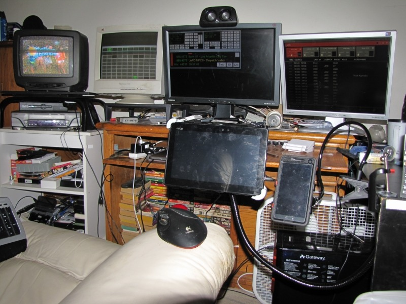 MikesPhotosUs's tweet photo. @Kevin_B_Haynes @graharg @gischatbot Three monitors is a necessity for GIS! A USB video card is perfect for adding that extra screen for around 20-30 dollars. Here's a slightly older photo (I've upgraded the tv) that shows my desk setup, with the additional tablet on an extension arm for tutorials/notes. https://t.co/myiOyQnud2