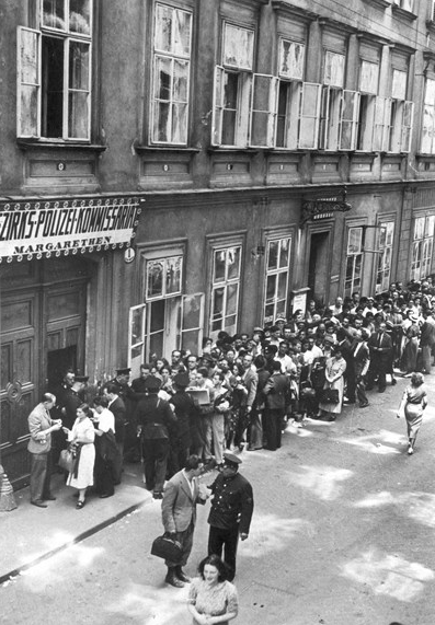 After SS soldiers enter the city of Vienna, Austria, (first picture, 12 ...