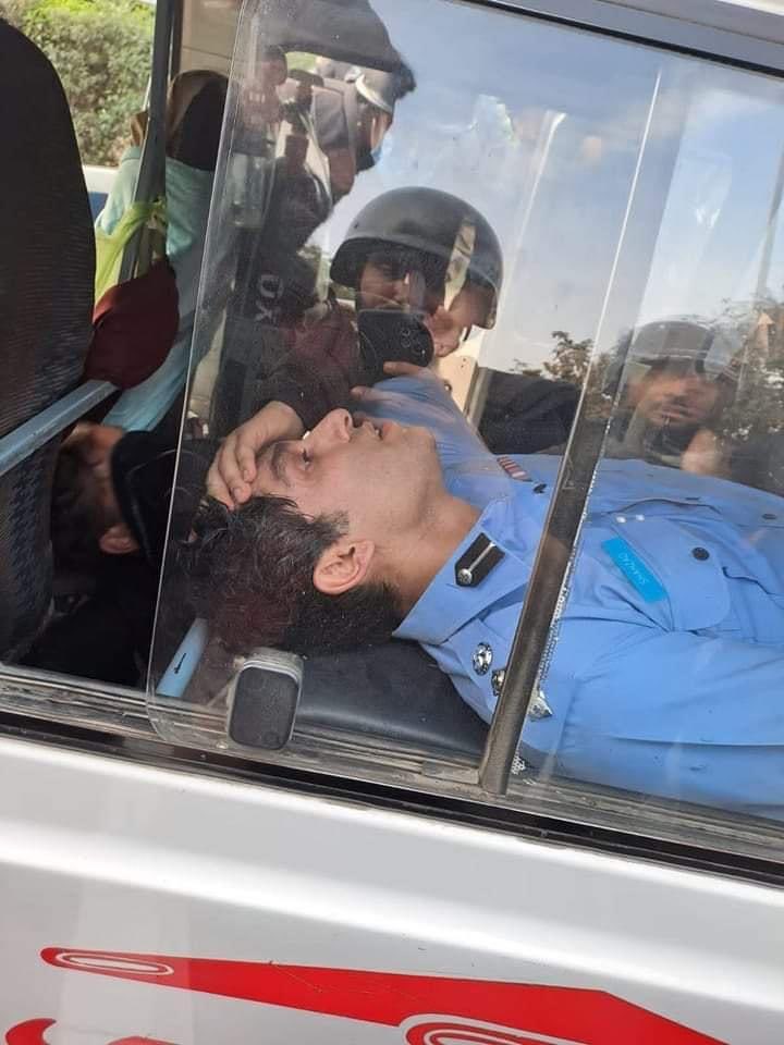 mirsuha1973's tweet photo. We students were peaceful, thats why you treated us brutally. This policeman himself beaten many students. But now PTI workers shown him that they are not peaceful 
 #RestoreQuaidians https://t.co/aaGZszOR0Z