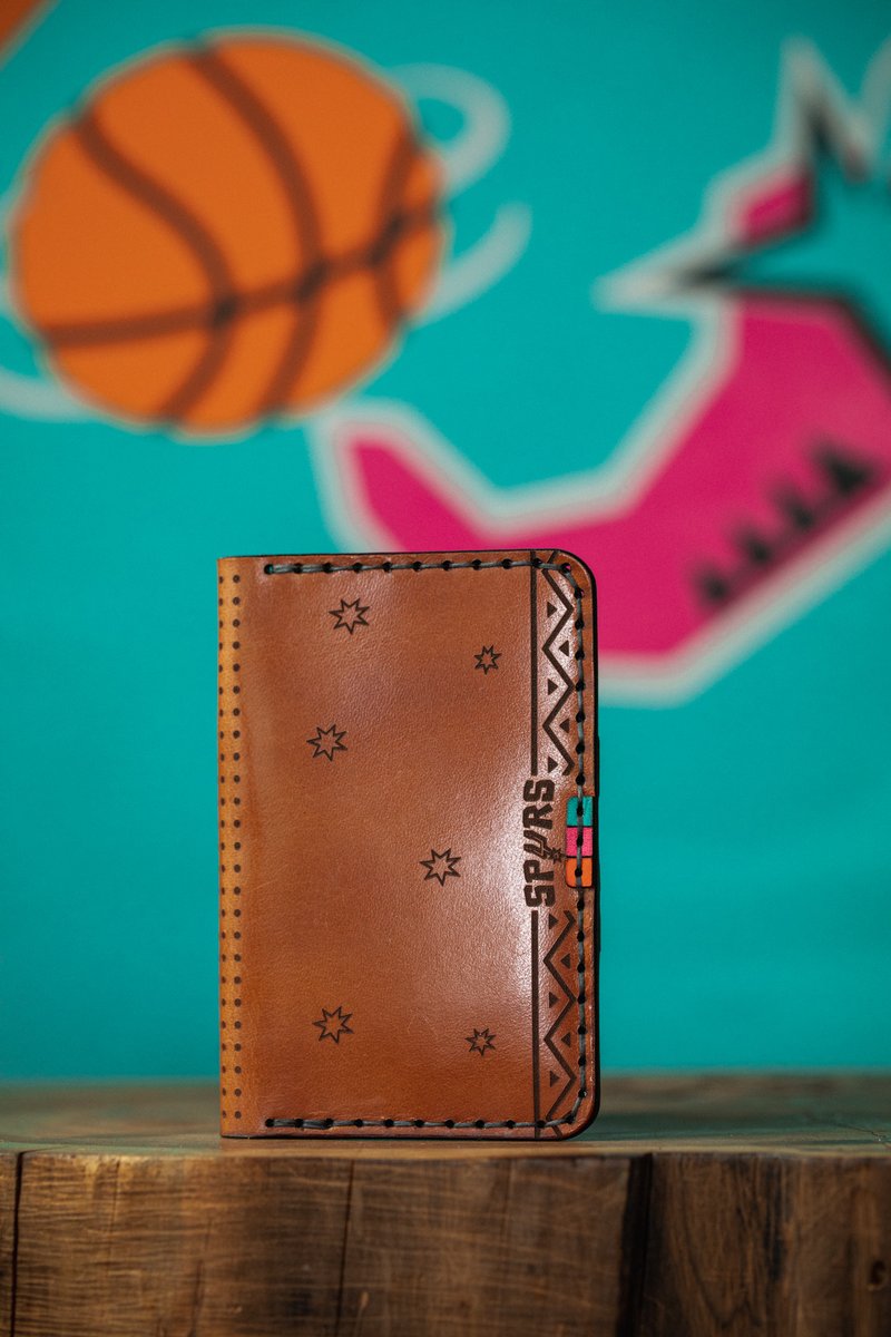 mySA's tweet photo. The collection will go on sale online at @BexarGoods and at Outland Provision on Saturday, March 18! 

The line of premium leather goods and apparel will include classic Spurs T-shirts, 1996 NBA All-Star Weekend T-shirts, caps, bandanas and more. #PorVida https://t.co/b3KCtwqfrW