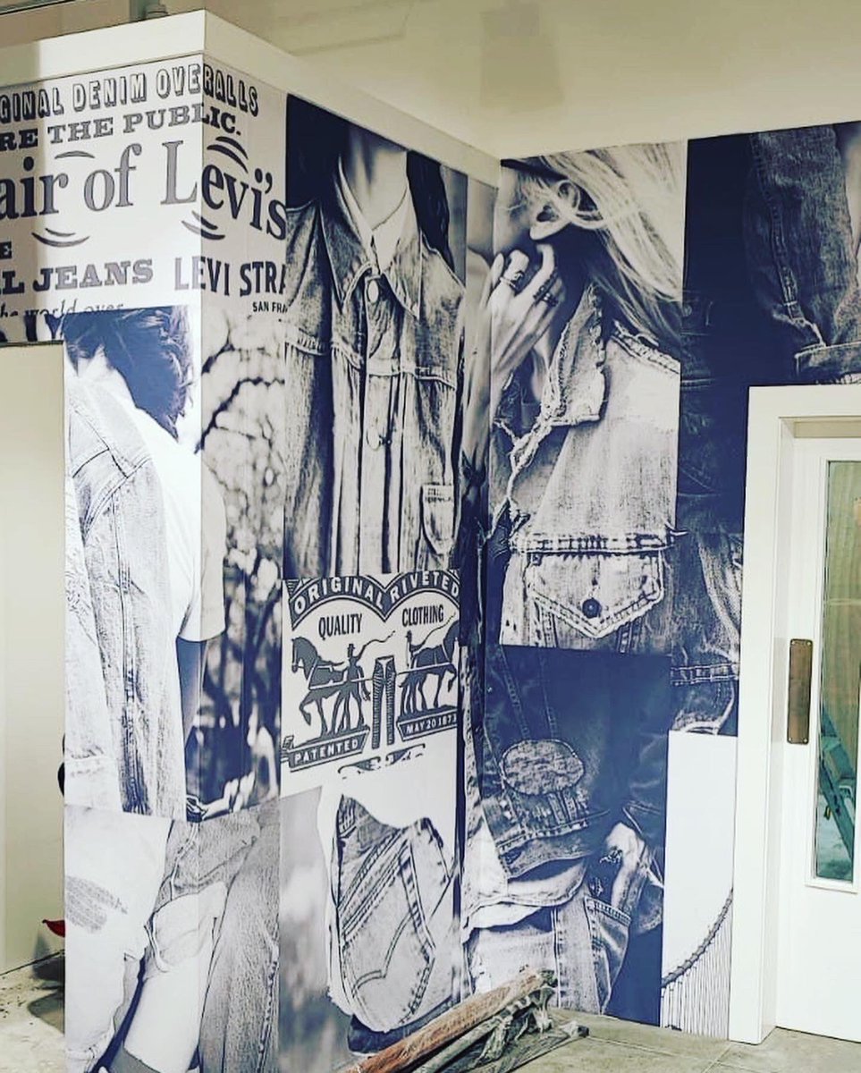 vvsltd's tweet photo. Installation of full wall vinyl graphics for @LEVIS Livingston, Scotland store #largeformatprinting #retailinterior https://t.co/iLfuXC2iWu