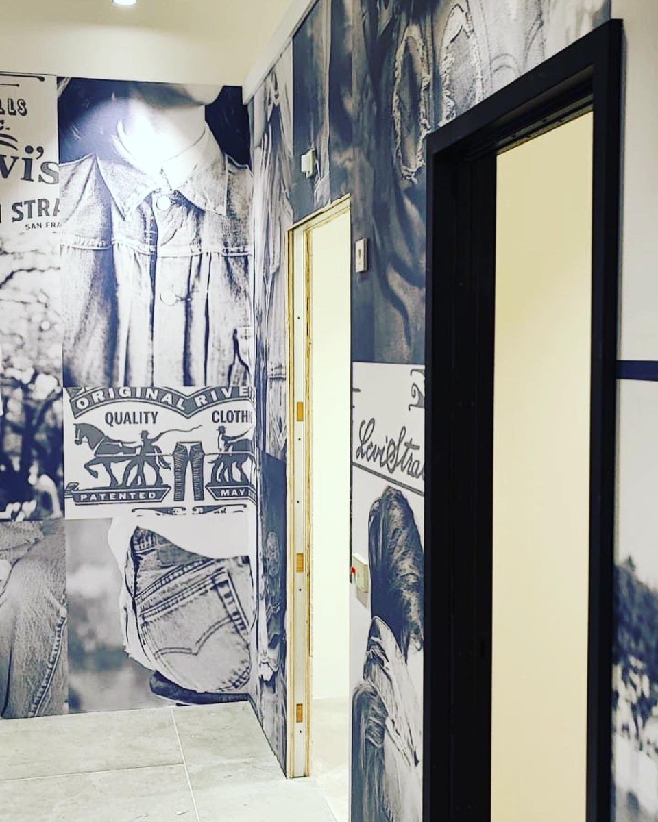 vvsltd's tweet photo. Installation of full wall vinyl graphics for @LEVIS Livingston, Scotland store #largeformatprinting #retailinterior https://t.co/iLfuXC2iWu