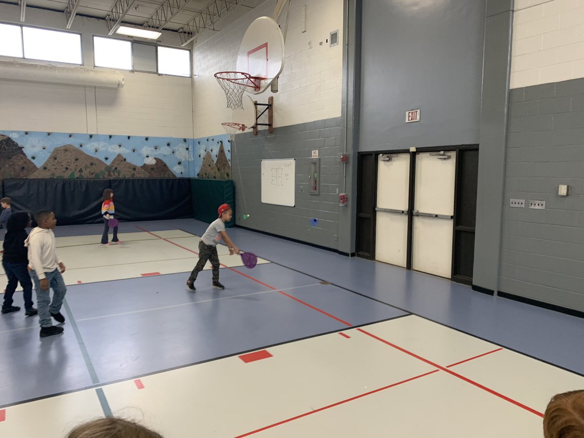 DuaneHawthorne's tweet photo. K-2 students @GivensElem practice striking the @GopherSport BiggieBirdie dangling from our basketball hoops. https://t.co/GvsKA0XurE