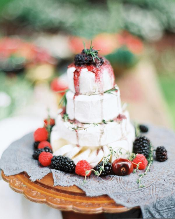 Celebrate your wedding day with a beautiful cheese wheel cake filled with berries and decorated with thyme and rosemary. We love this alternative to a traditional wedding cake! 

#cheeewheelcake #alternativeweddingcakes #weddings #raleighbaker #baker #cakedecorator ​​​​�