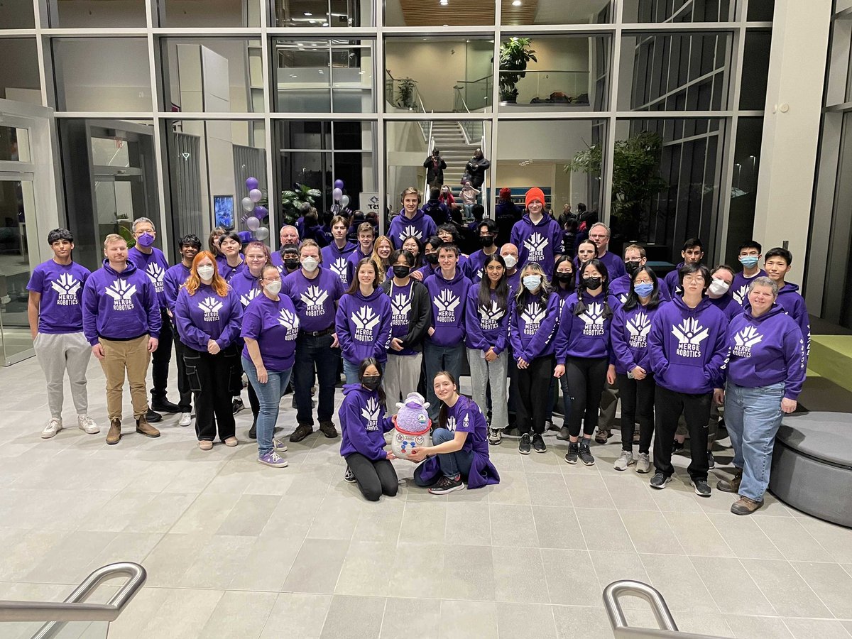 frc2706's tweet photo. A great group photo from the robot reveal party! #firstenergize #chargedup #friendswithrobots https://t.co/IoyRQBaQbQ