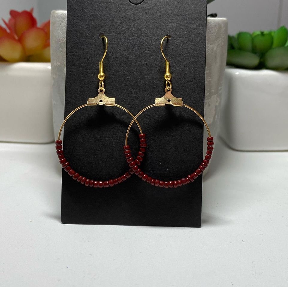 Excited to share the latest addition to my #etsy shop: Burgundy Seed Bead Earrings etsy.me/3mTnKKt #red #women #circle #seedbeadjewelry #seedbeadearrings #hoopearrings #beadedearrings #beadedjewelry #giftideas #love2jewelry