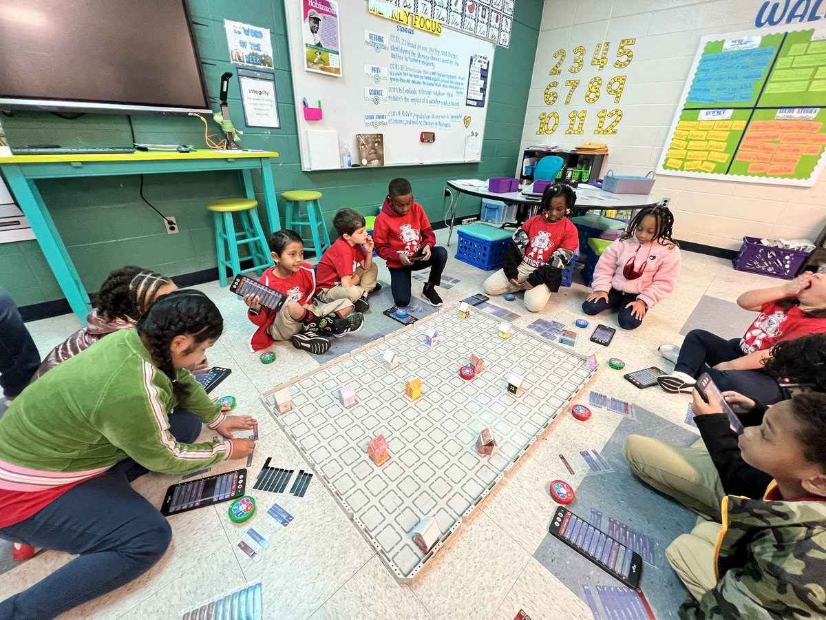 MsLawrenceMPS's tweet photo. This week the K-2 @academy_ib Robotics team set up a neighborhood and coded their robots to play “Ding Dong Ditch” on each other’s houses! These kids are incredible! @MPSAL @MPSEdTechnology https://t.co/VzcqphfbFt