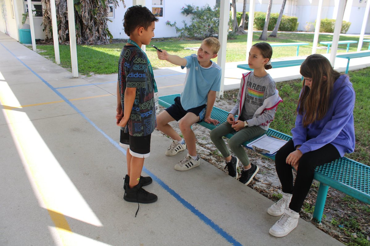 hhepantherpost's tweet photo. We love doing interviews! Getting started on our end of year issue of The Panther Post 🎤💛💙📰🐾 

📸 by Trent and Lucca! 

#hhepantherpost #youngjournalists #interview #kidinterview @jdfossas @browardschools https://t.co/H56l1G4ETa