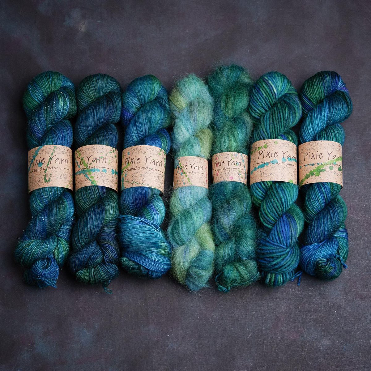 PixieYarn's tweet photo. ‘Eccles The Sea Serpent’

Is my eastangliayarnfestival show colourway.

Using colours voted for by you and inspired by Norfolk folklore.

Layers of many greens, blues and teals.

It’ll be available on bases from Chunky to laceweight.
.
.
#handdyedyarn #eastangliayarnfestival2023 https://t.co/fHvMUcYHHJ